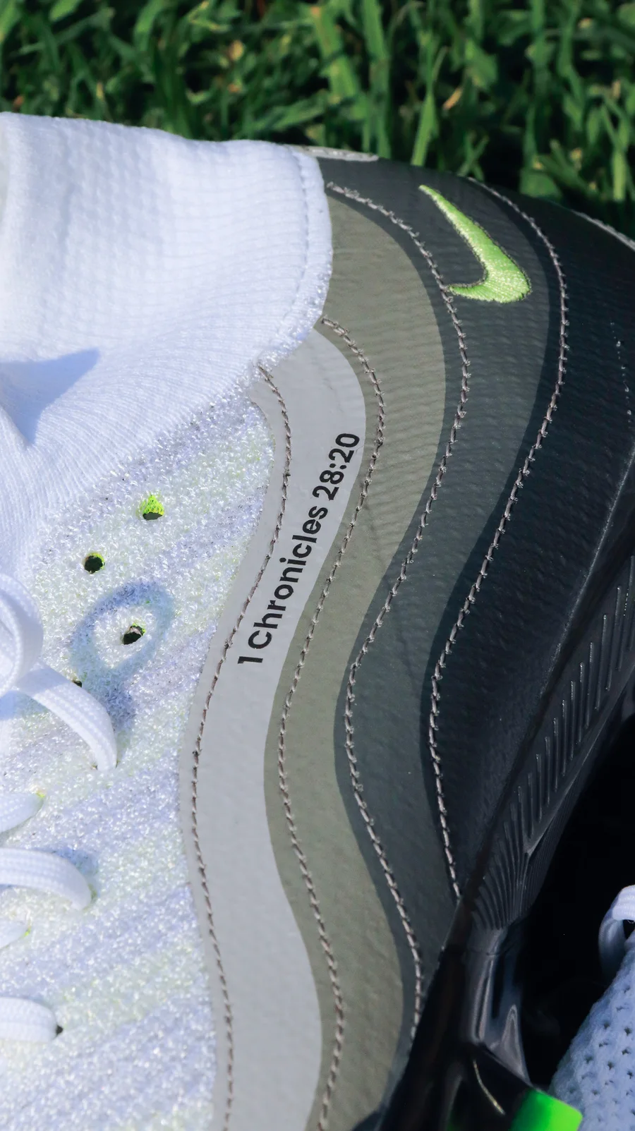 Close-up of a Bible verse transfer on a boot tongue