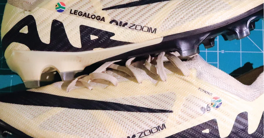 Boot with name and flag transfer applied, side view