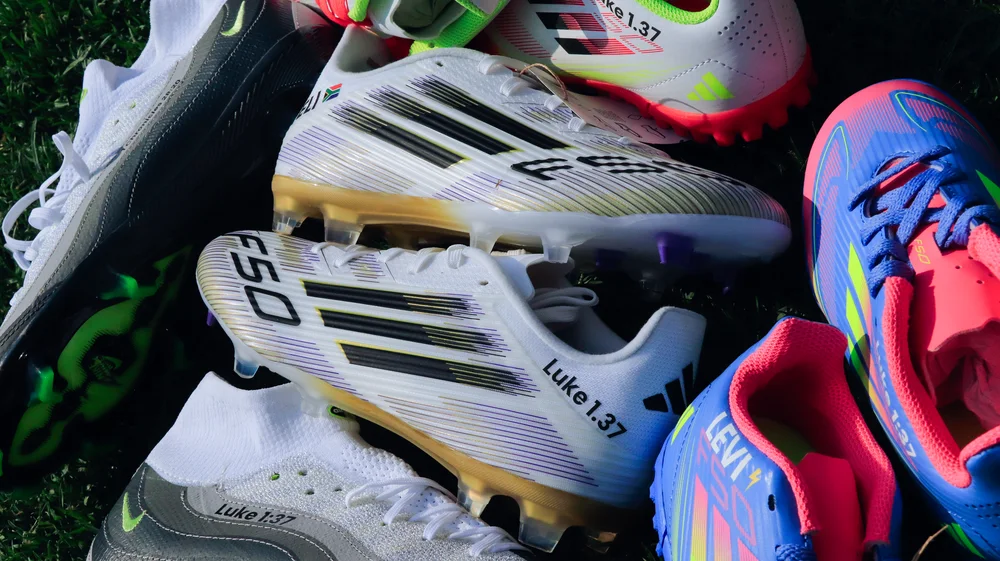 More personalised boots showing player names and verses