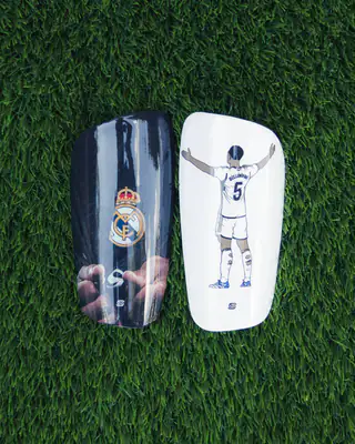 Pair of shin pads: Real Madrid crest and Bellingham celebrating